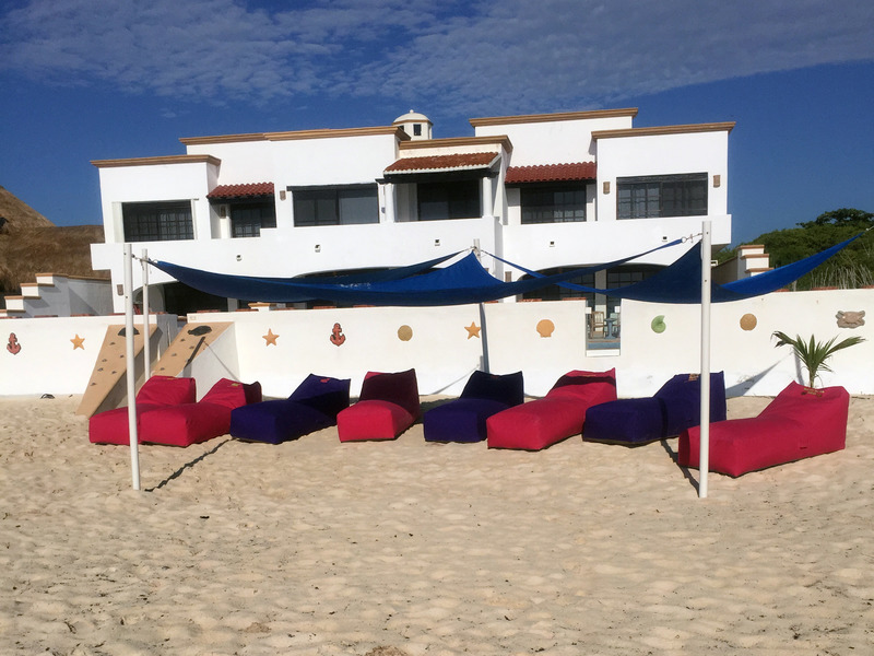 Secret Beach Villas: Beach Club with sun sail shades